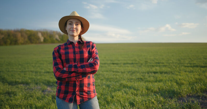 Woman standing outside in a field